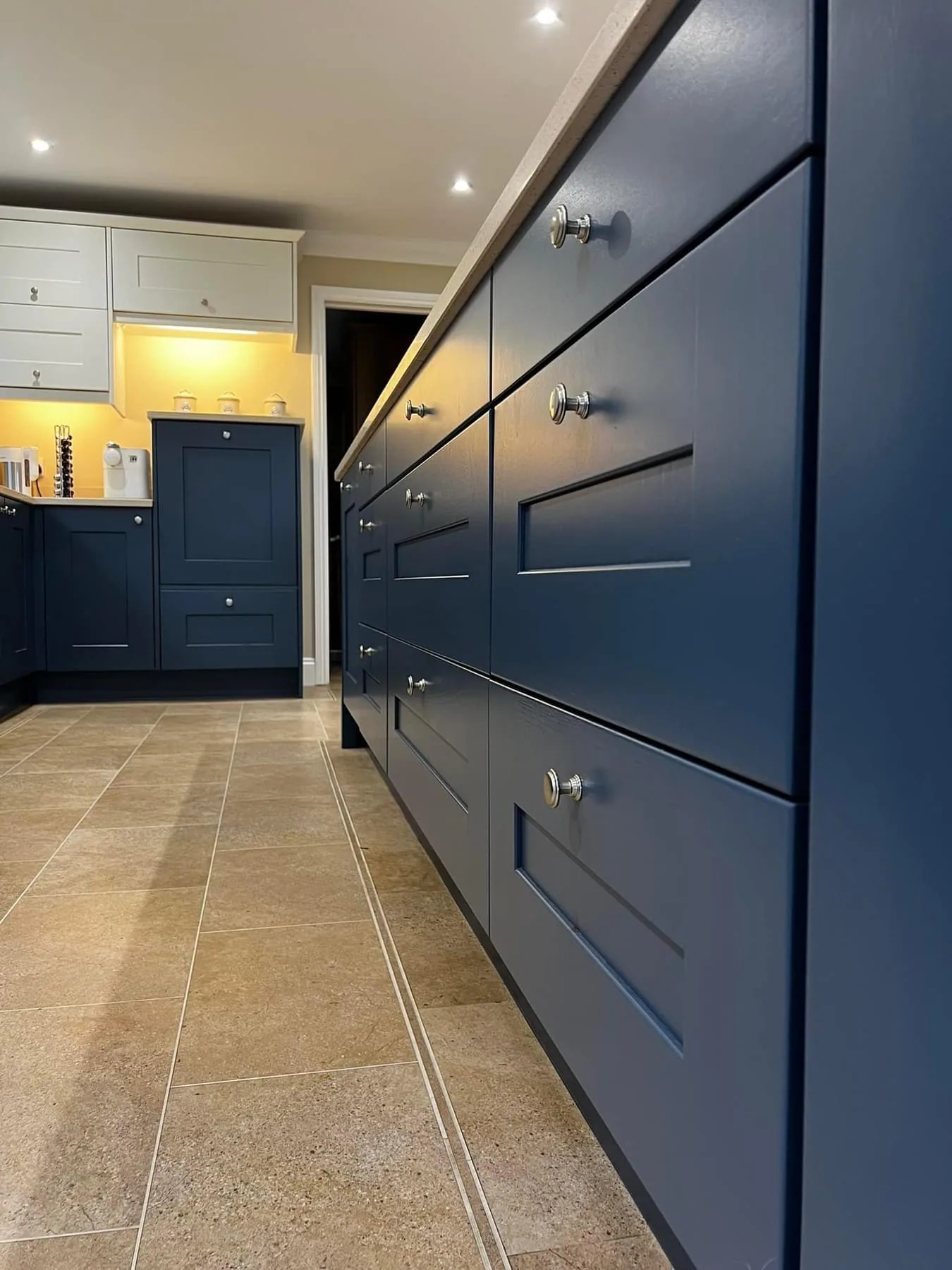 Navy shaker kitchen drawers resprayed by The Premiere Kitchen Painting Co.